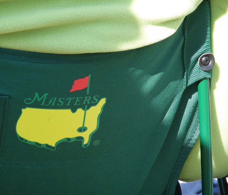 Fan sitting in Masters chair during the LPGA Coates Golf Championship at Golden Ocala 