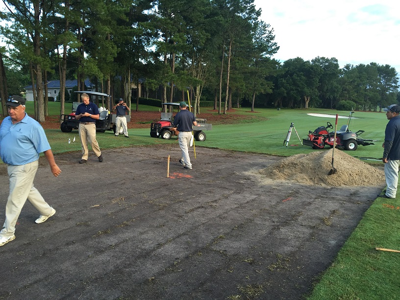 Golf course maintenance crew works to build new tees at holes 13, 15 & 16.