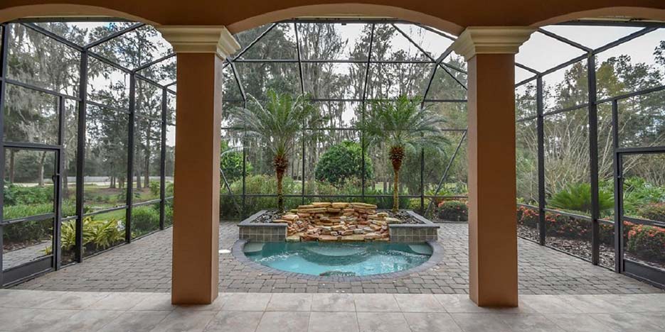 Pool and patio at Grotto Park home