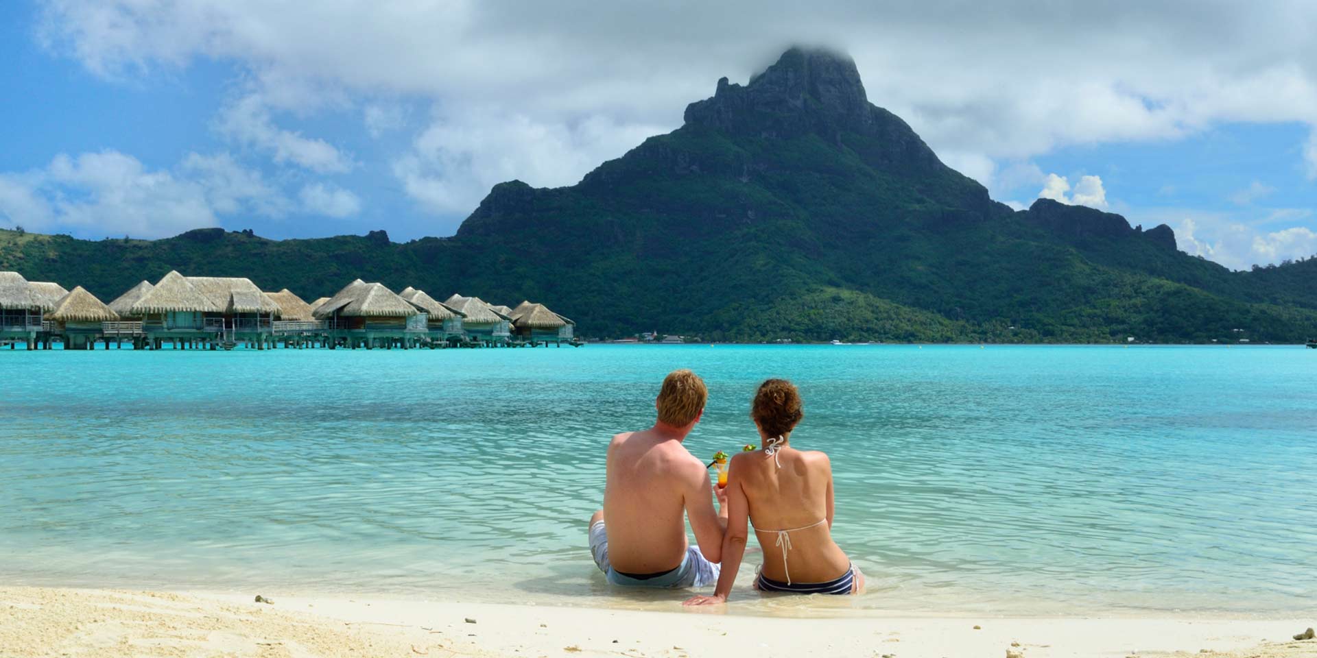 couple enjoying their honeymoon on an island