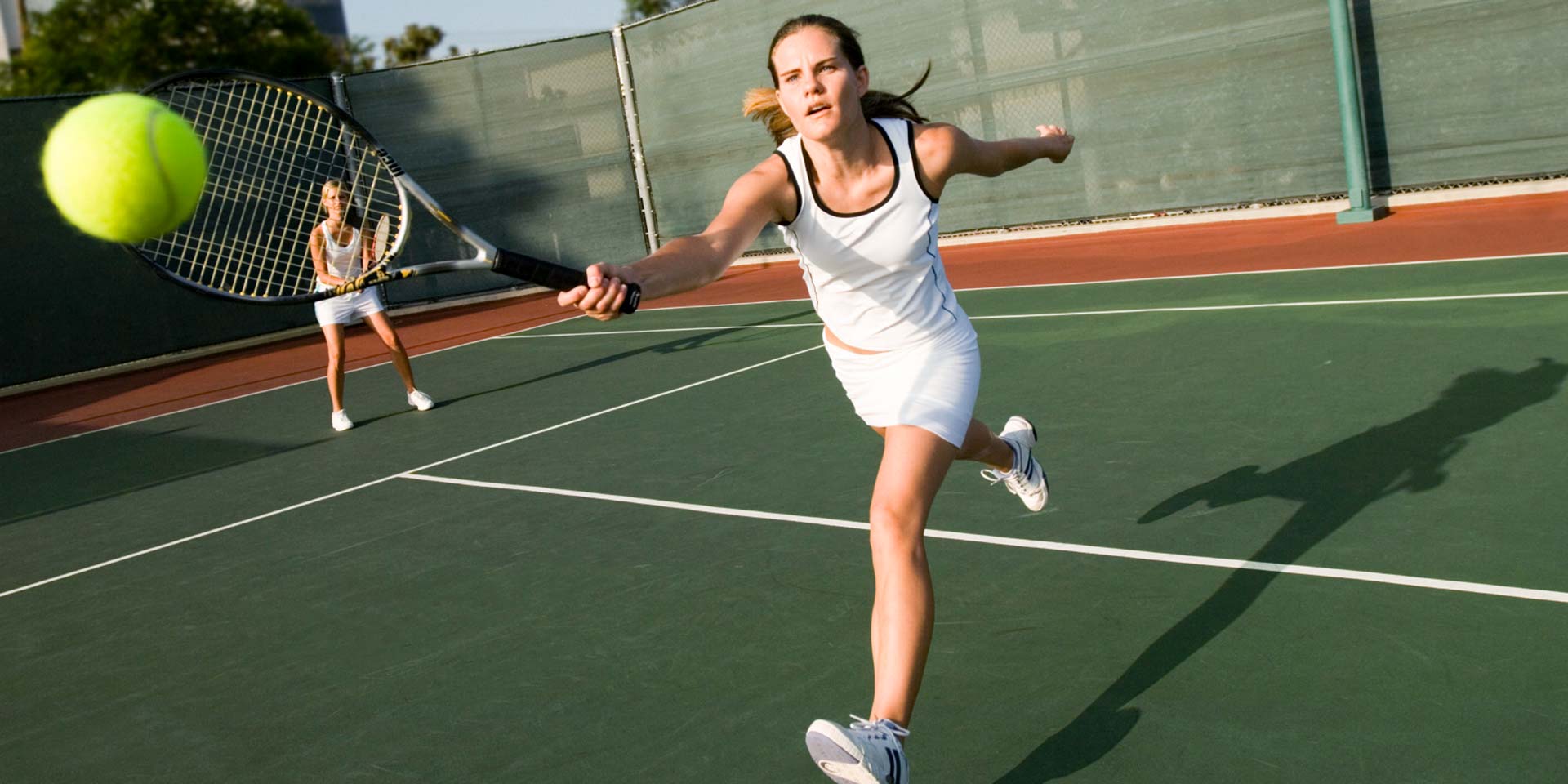 Woman playing tennis in Ocala.